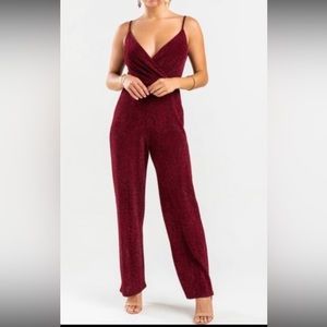 Red sparkly jumpsuit. This is from Francesca’s. Adjustable straps.